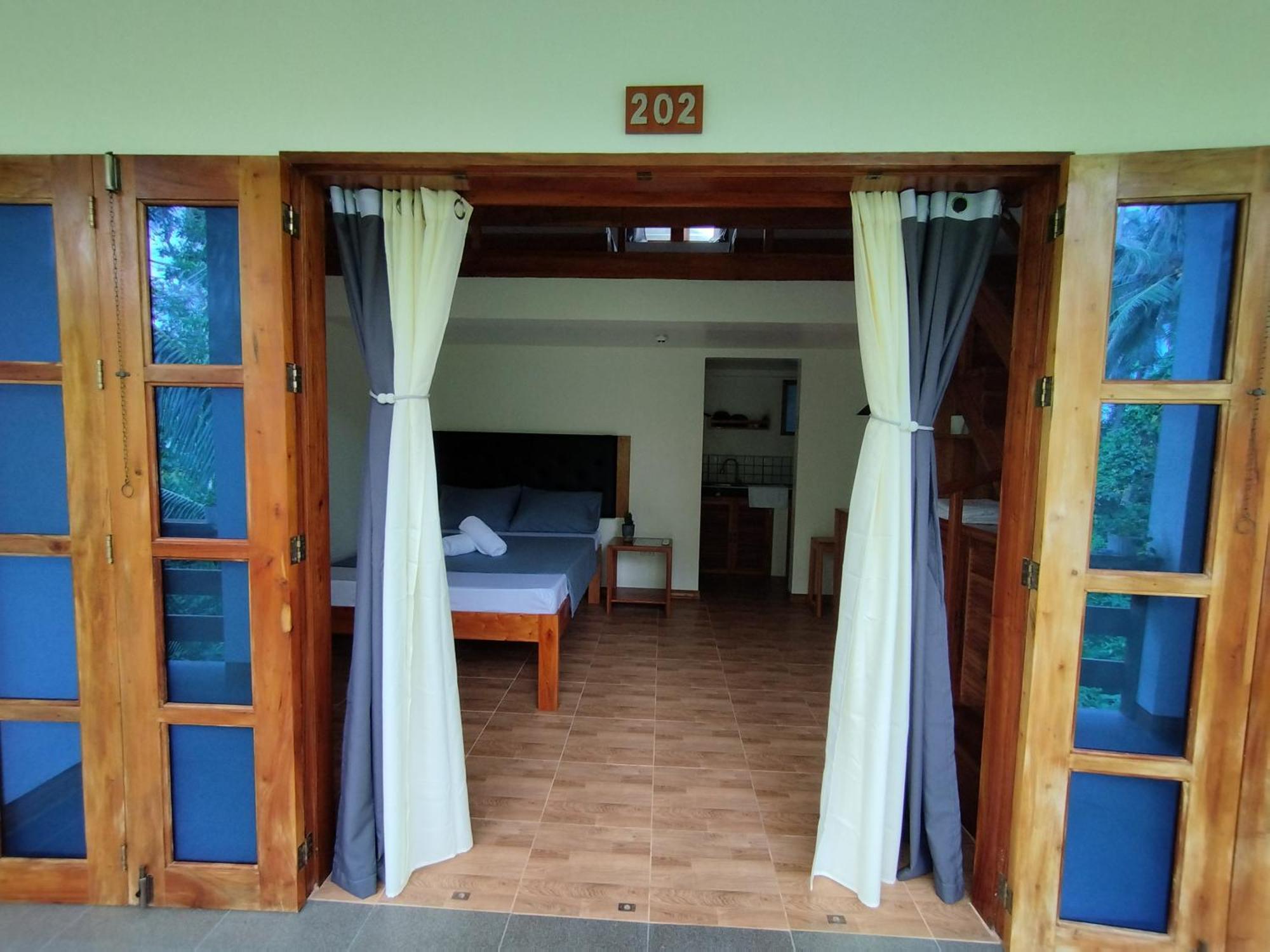White Bada Guesthouse Siquijor Habitación foto